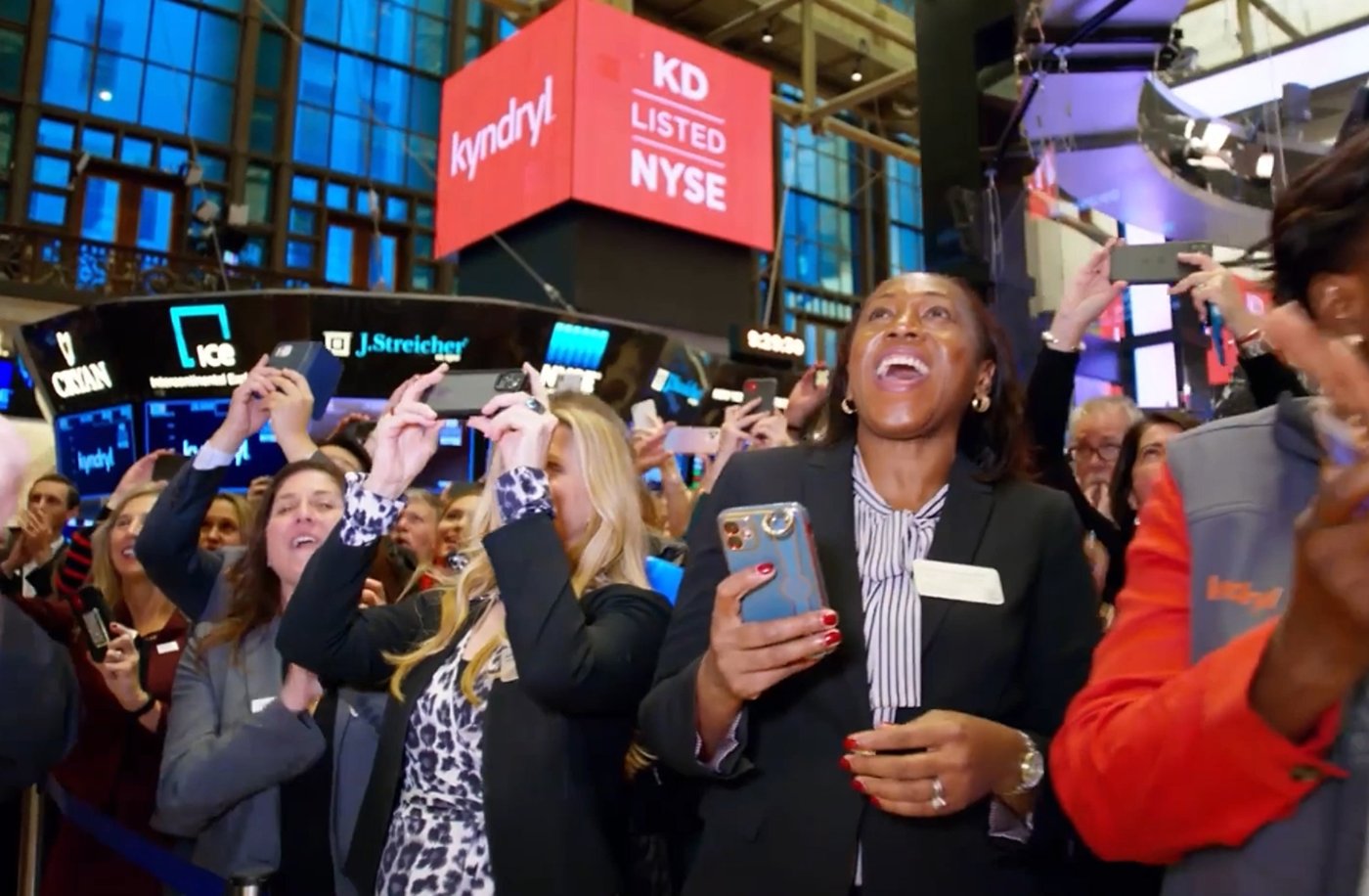 Kyndryl employees celebrating Kyndryl being listed on the NYC stock exchange